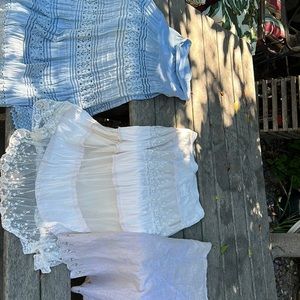Lacy skirts. 2 size large. I blue one size small. Worn once/twice. $10.00 each